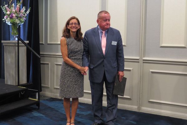 Dean Jennifer Rosato Perea, Board of Governors Award recipient,&nbsp;and President Russell Hartigan
