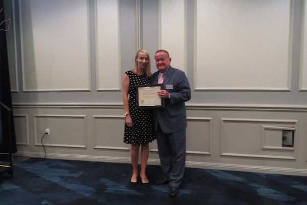 Jessica Hegarty, Presidential Commendations Award recipient,&nbsp;and President Russell Hartigan
