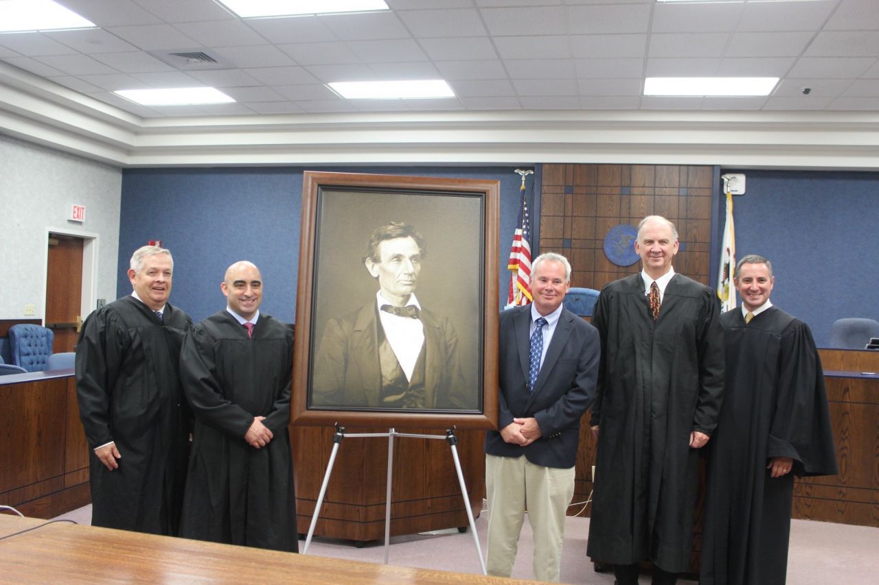 A high-quality reproduction of a famous Abraham Lincoln photograph was presented to the Edwards County Courthouse on August 17 in Albion. 