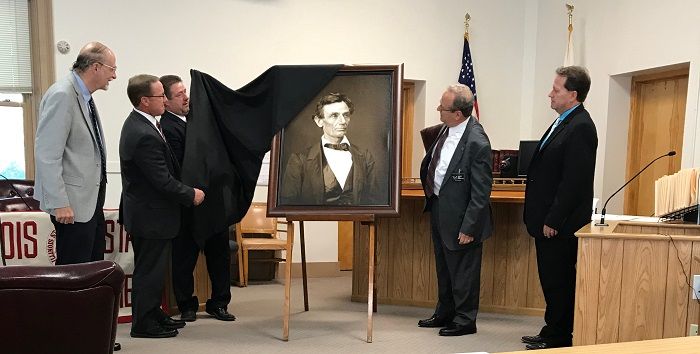 A high-quality reproduction of a famous Abraham Lincoln photograph was presented to the Henderson County Courthouse on July 27 in Oquawka.