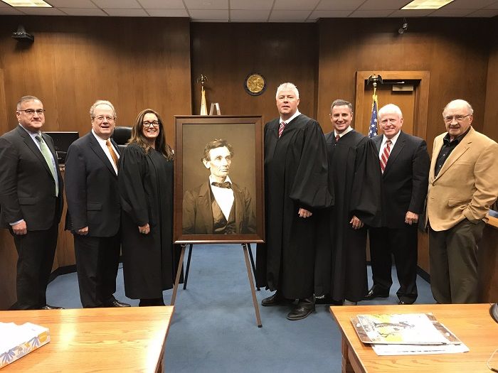 A high-quality reproduction of a famous Abraham Lincoln photograph was presented to the Christian County Courthouse on November 30 in Taylorville. 