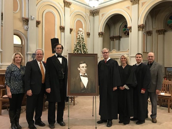 A high-quality reproduction of a famous Abraham Lincoln photograph was presented to the Macoupin County Courthouse on December 8 in Carlinville. 