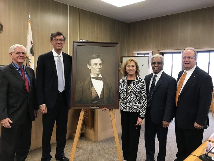 A high-quality reproduction of a famous Abraham Lincoln photograph was presented to the Mercer County Courthouse on October 26 in Aledo. 
