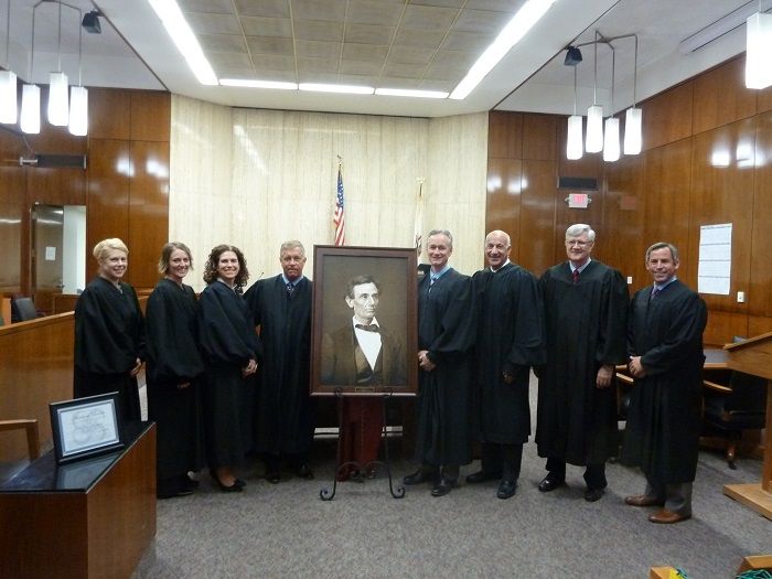 A high-quality reproduction of a famous Abraham Lincoln photograph was presented to the Peoria County Courthouse on October 17. 