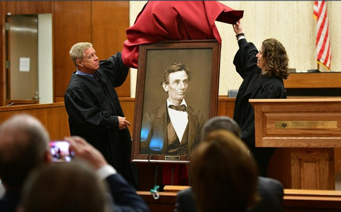 A high-quality reproduction of a famous Abraham Lincoln photograph was presented to the Peoria County Courthouse on October 17. 