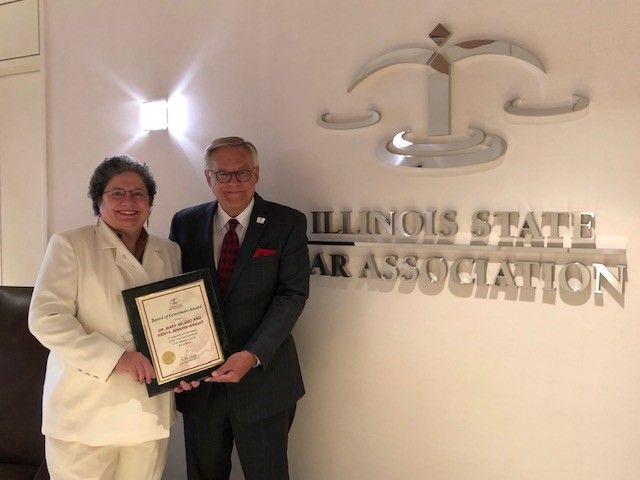 Dr. Mary Milano and ISBA President Dennis Orsey