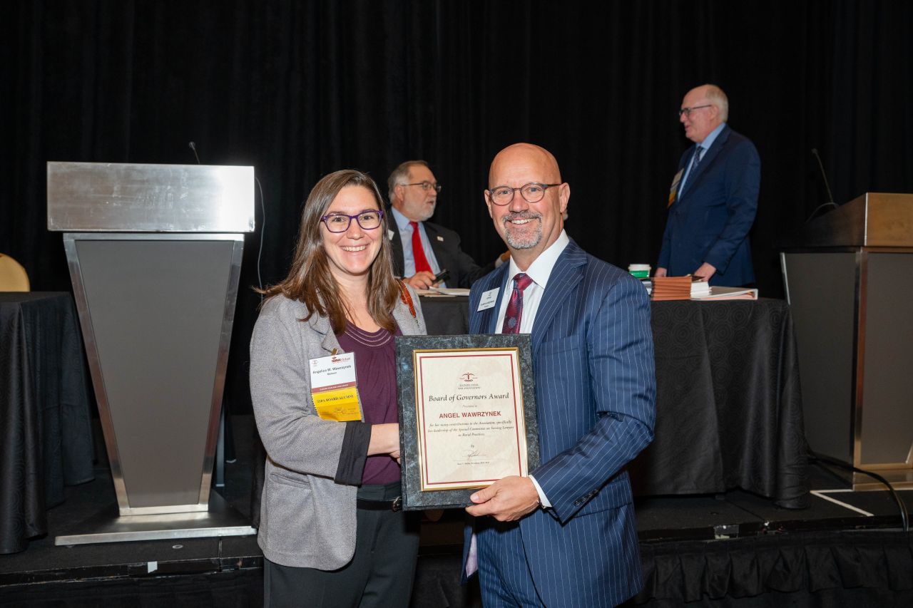 President Kasserman presented the Board of Governors Award to Angel Wawrzynek for her leadership of the Special Committee on Serving Lawyers in Rural Practices. 