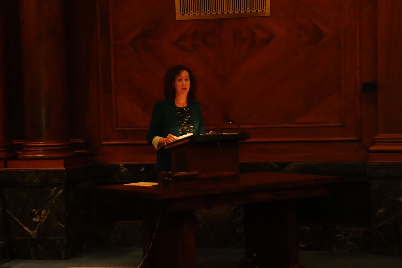 Retired Illinois Supreme Court Clerk Carolyn Taft Grosboll addresses the Fourth Judicial District candidates at the morning ceremony.