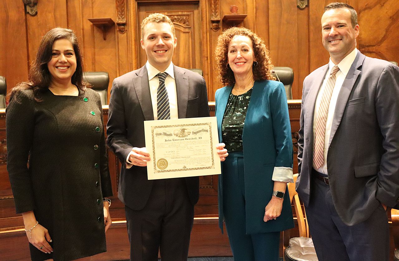 (2nd from left) New lawyer John Grosboll posed with his mom (center) Carolyn Taft Grosboll, Retired Clerk of the Supreme Court, who was a featured speaker during the morning ceremony. Illinois State Bar Association (ISBA) Board of Governors' Members Nargis Khokhar (left) and Mark Palmer (right), who is also the General Counsel of the Illinois Supreme Court's Commission on Professionalism, served as speakers for the Fourth Judicial District ceremonies.