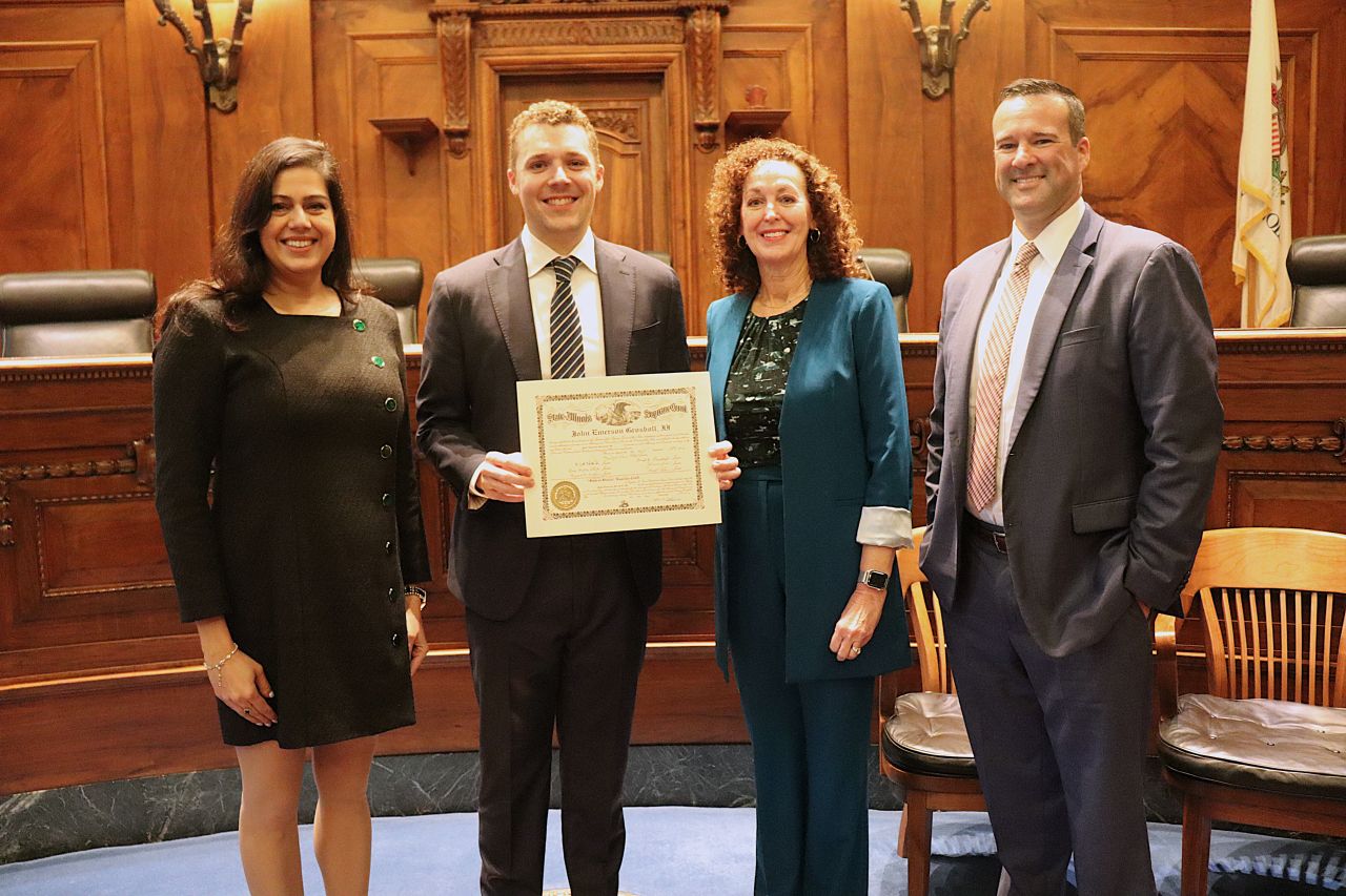 (2nd from left) New lawyer John Grosboll posed with his mom (center) Carolyn Taft Grosboll, Retired Clerk of the Supreme Court, who was a featured speaker during the morning ceremony. Illinois State Bar Association (ISBA) Board of Governors' Members Nargis Khokhar (left) and Mark Palmer (right), who is also the General Counsel of the Illinois Supreme Court's Commission on Professionalism, served as speakers for the Fourth Judicial District ceremonies.