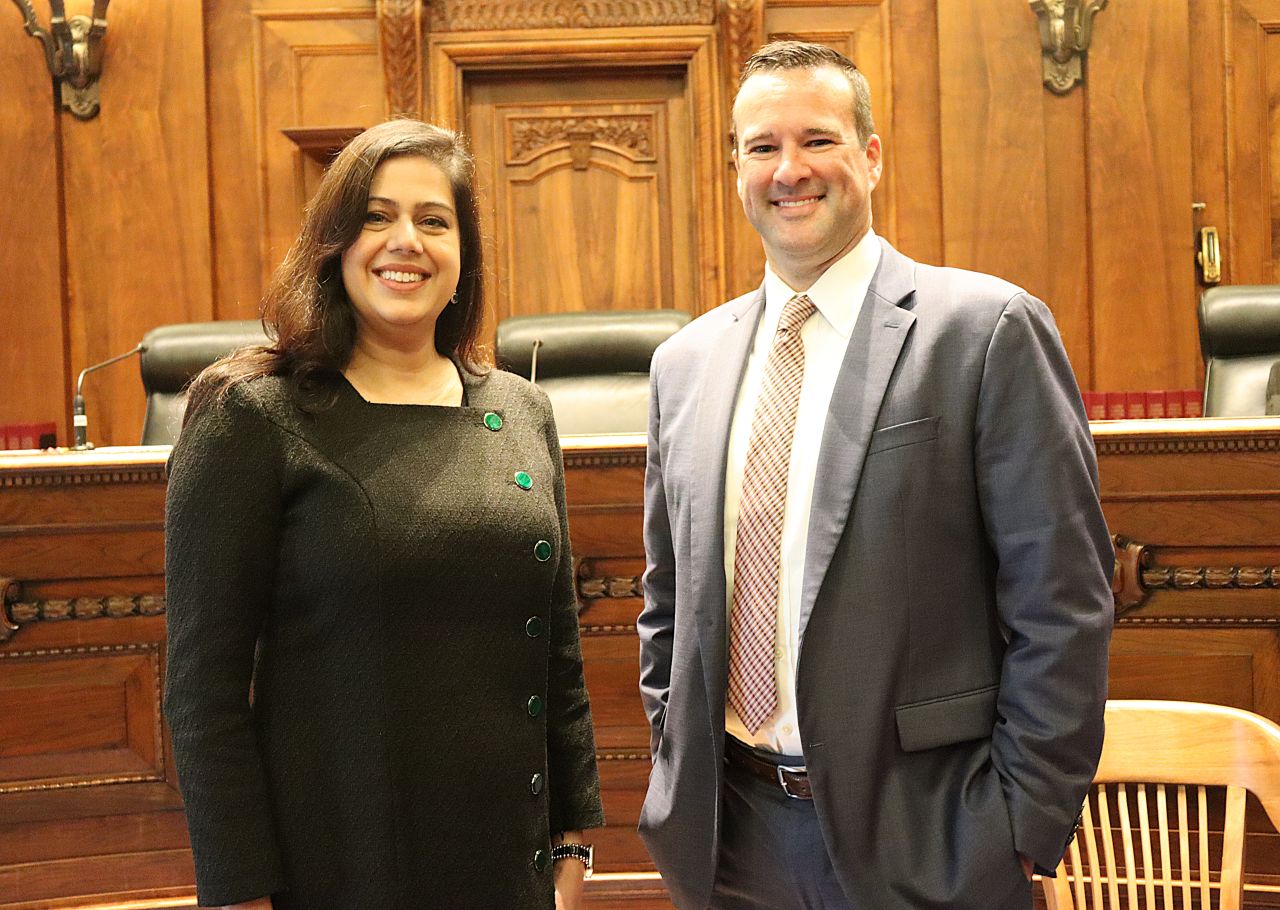 Illinois State Bar Association Board of Governors' Members Nargis Khokhar (left) and Mark Palmer were speakers for the Fourth Judicial District ceremonies.