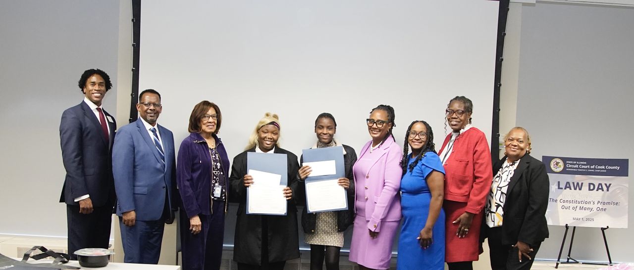 (L-R) CCBA President-Elect, Antonio C. Lee; ISBA Assistant Executive Director for Member Services, Ernest Barrens; CCBA Foundation President, Anne Fredd; 1st Place Essay Award Winner, Abria Cheers (Chicago Vocational Career Academy); 2nd Place Essay Award Winner, Torrey Page (Calumet Middle School); keynote speaker, Judge Toya Harvey; Judge Kenya Jenkins-Wright, Co-Chair; Lori Roper, Co-Chair; & CCBA Executive Director Cordelia Brown