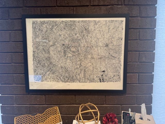 Heather Kroencke: "My prized possession in my office is this map created by my maternal grandfather in 1971. My grandfather was a geologist who worked for a large oil company. Back then, these maps/surveys were done by hand and based on extensive research to locate potential oil and gas deposits. It's a great conversation piece for clients, and I have even had a few who could read and interpret it over the years. However, the best part is my grandfather's signature in the bottom corner."