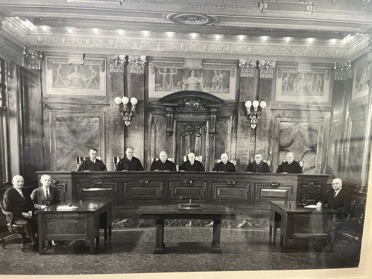 Scott Lerner: "I'm afraid I don't have much information. I got this at an estate or garage sale around 20 years ago. The justice on the far left looks like Walter T. Gunn who served on the court from 1938-1951. The justices are all white men, and the image is in black and white, giving hints at the age of the photograph. It may be a gelatin silver image. That's my guess."