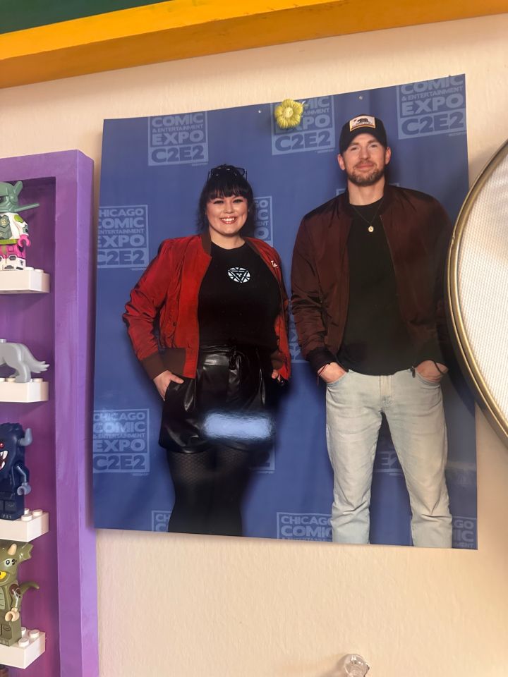 Justyna Palasiewicz: "My prized possession is this photo of me with Captain America, himself—Chris Evans. This photo was taken at C2E2 in 2023 and yes, the man smelled like delicious freedom. I am a huge fan of Marvel and could not pass up the opportunity to be this close to one of the Avengers."