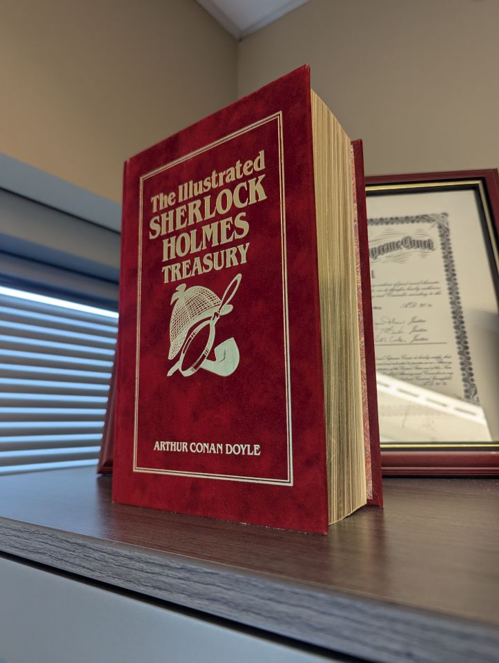 Ryan Prickel: "My prized office possession is my red-felt hardcover illustrated Sherlock Holmes Treasury book, containing all unabridged Sherlock Holmes stories with the original illustrations, bound with gilded pages. I have always been a big fan of the series, and I had a lot of fun discovering the book at a small antique shop near Starved Rock State Park. It helps serve as a reminder - 'The secret of getting ahead is getting started.'”