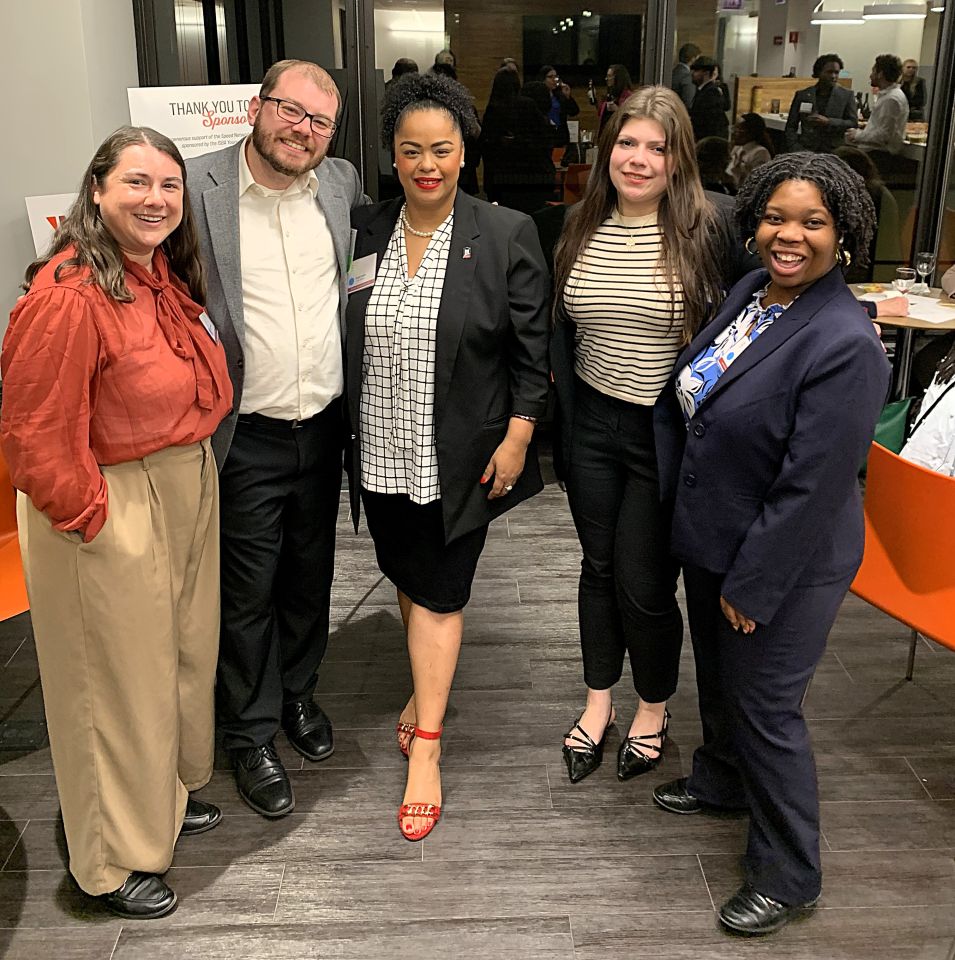 NIU Law Students attend the Wine Tasting Event and network with YLD Secretary Olivia Basu (far left) and YLD Chair Jason Blumenthal (2nd to left).