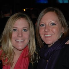 Two guests enjoy the party.