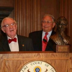 Justice John Paul Stevens accepts a replica of the Abraham Lincoln bust the ISBA commissioned for the Lincoln bicentennial from ISBA President Jack Carey. 