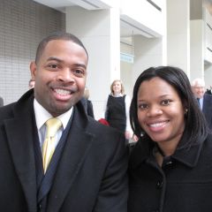 James Liggins, a Michigan state graduate admitted to the bar on Thursday, with his wife, Jyllian