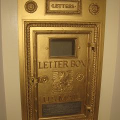 Post office letter box in Elmore & Reid hallway