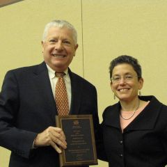 IBF past president David Sosin presents the Distinguished Service to Law & Society Award to Judge Nancy J. Katz
