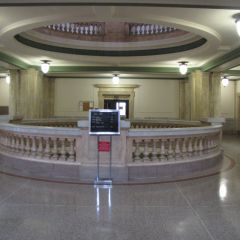 Marble railings are the centerpiece of the second and third floors.