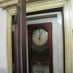 Antique wall clock on the first floor