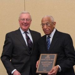 President O'Brien presents Judge Leighton with the ISBA's first Diversity Leadership Award