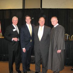 ISBA President John O'Brien, new admittee Thomas Howard, his father, ISBA member Tim Howard and Justice Thomas L. Kilbride
