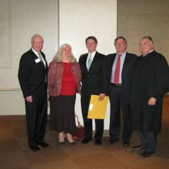 ISBA President John O'Brien, Deb Baron, her son, new admittee David Baron, his father, ISBA member Dennis Baron and Justice Robert L. Carter