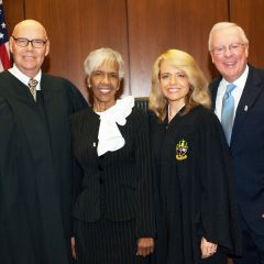 Chief Judge James F. Holderman (left) and Chapter Justice Michele M. Jochner (second from right), welcome two members of the new initiate class: Hon. Arnette R. Hubbard of the Circuit Court of Cook County, and John G. O'Brien, president of the Illinois State Bar Association.  