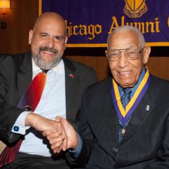 Judge William Hooks congratulates Judge Leighton.