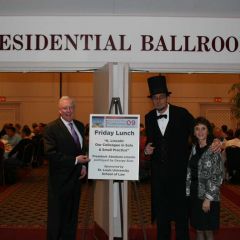 ISBA President, John O'Brien, George Buss (a.k.a. Abe Lincoln), and ISBA Director of Bar Services, Janet Sosin, pose for the camera before Friday's luncheon.