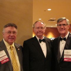 Alan Pearlman (left), State Supreme Court Justice Thomas Kilbride and U.S. Central District Chief Judge Michael McCuskey attend the Opening reception.