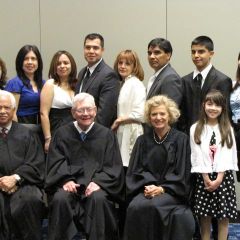 New admittee David Froylan and family with the justices.