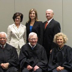 New admittee Colleen DeRosa and family with the justices.