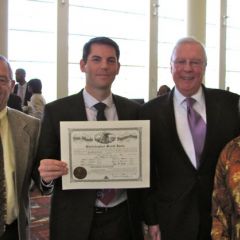 New admittee Christopher Iaria of Wheaton with his parents Joe and Marybeth with President O'Brien.