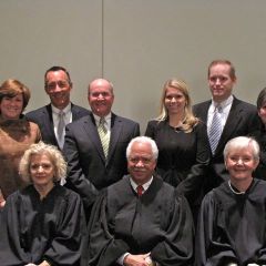 New admittee Kathryn Fox with her family and the justices.
