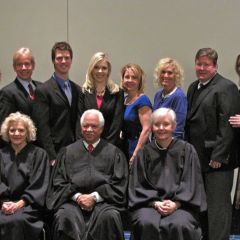 New admittee Shauna Martin with her family and the justices.