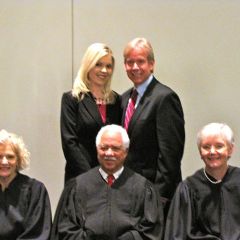 New admittee Shauna Martin with her father, ISBA member Jeffrey Martin and the justices.