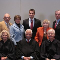 New admittee Kevin Sterk with his family and the justices.