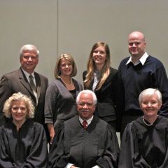 New admittee Michelle Olson with her family and the justices.