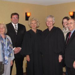 New admittee  Mike Welsh-Phillips with his family and Justices Burke and Theis
