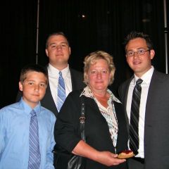 New admittee Paul Gantner (right) of St. Louis with his family, Tom, Tim and Anne Gantner.