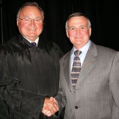  New admittee Thomas Mathews of Lee Summit, MO with Justice Karmeier.  Not only is Mr. Mathews a new lawyer, he is also a Doctor of Osteopathic Medicine.