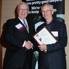 President O'Brien presents a 5-year Newsletter Service Award to William J. Brinkmann
