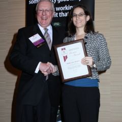 President O'Brien presents a 5-year Newsletter Service Award to Debra Liss Thomas