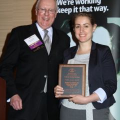 President O'Brien presents the YLD/Law Student Division Public Service Award to Jennifer Grobelski