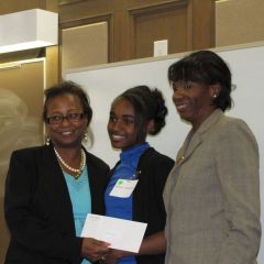 Buford and Perkins present the 3rd place award to Quinnyata Bellows.